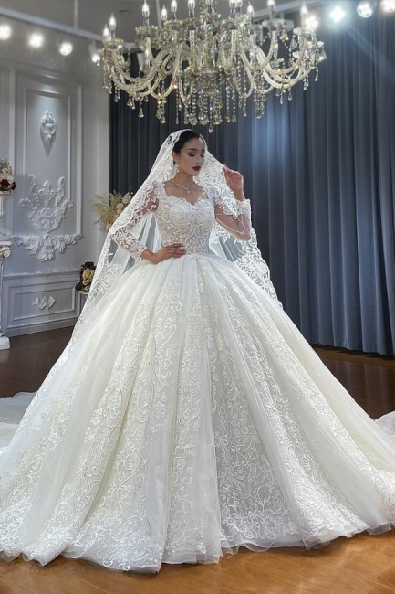 Robe de mariée princesse de luxe en dentelles haute couture sur mesures chic et unique